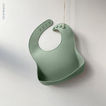 Silicone waterproof Bib with deep scoop to catch food whilst weaning, sage green colour from the UK